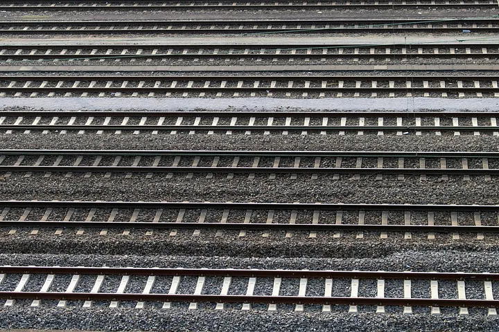 Multiple parallel railway tracks viewed from above